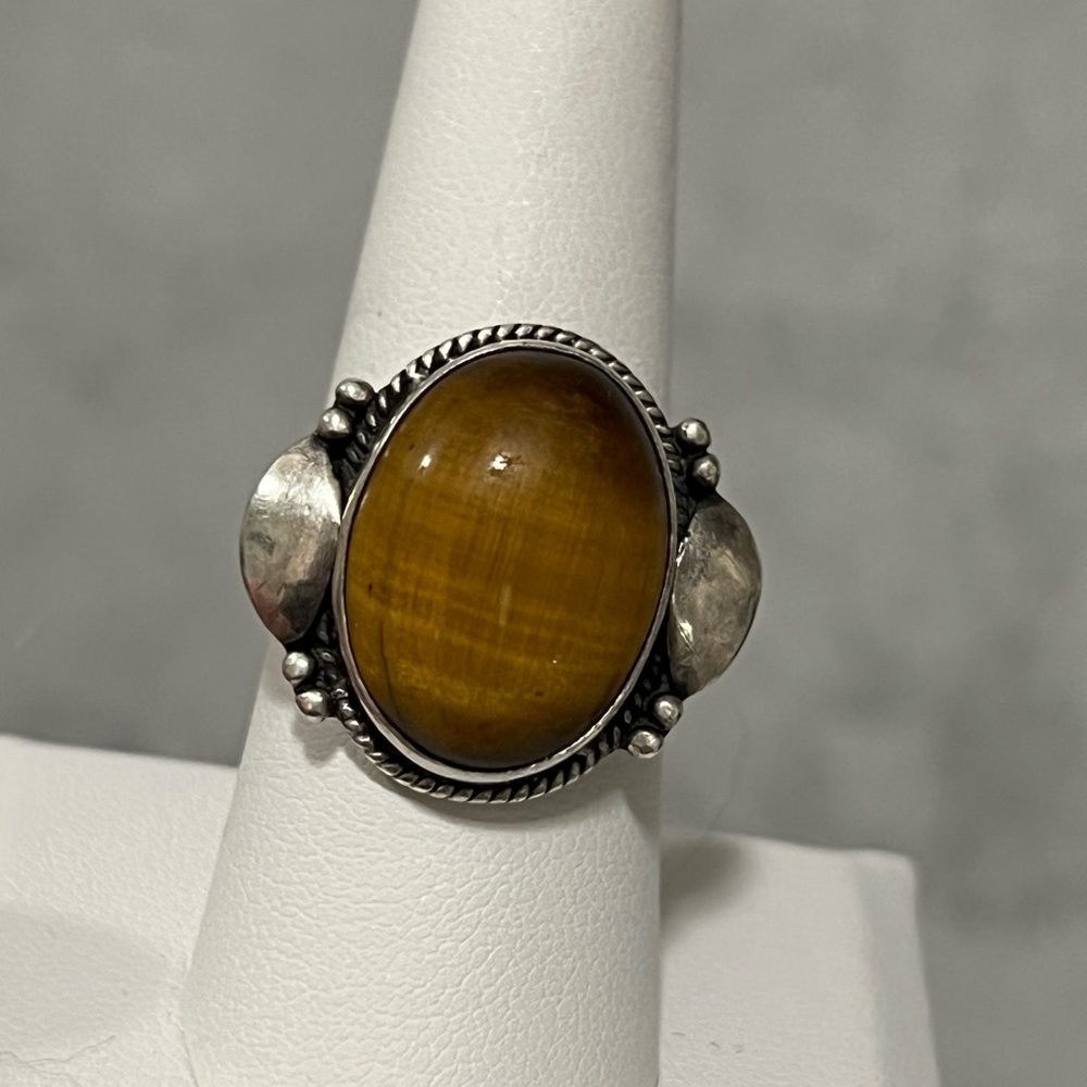 vintage sterling silver tiger's eye ring with a large oval cabochon stone